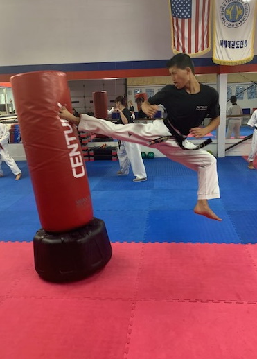 Black Belt Flying Side Kick
